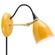 Lovell Plug-In Wall Scone, 550-Porcelain Yellow, Raw Brass Arm, SBK-Standard Black Cord Lovell Plug-In Wall Scone, 550-Porcelain Yellow, Raw Brass Arm, SBK-Standard Black Cord