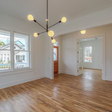 Downtown Minimalist 5-Light Chandelier, 100-Black Finish, 60W G40 White Bulbs | Photo Courtesy of Maddock Building and Realty Co. Downtown Minimalist 5-Light Chandelier, 100-Black Finish, 60W G40 White Bulbs | Photo Courtesy of Maddock Building and Realty Co.