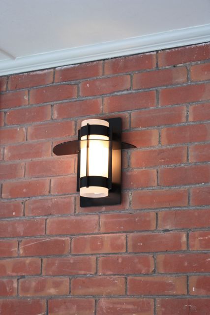 wall mount comet sconce exterior