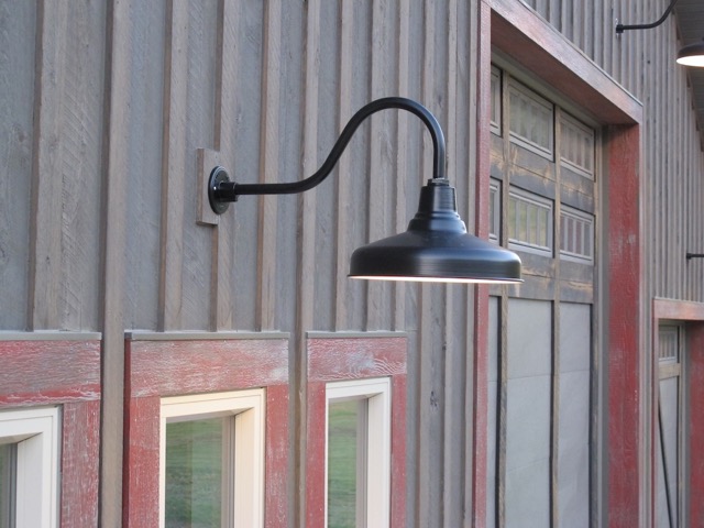 rustic gooseneck light outdoor kitchen