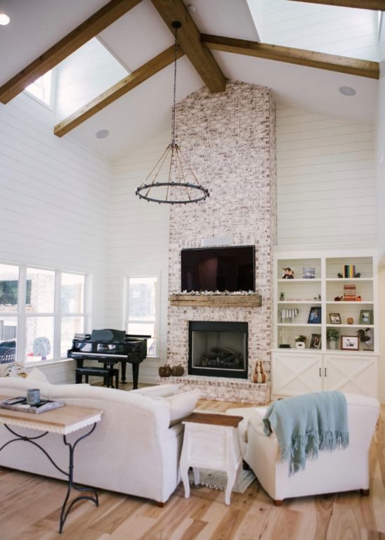 Farmhouse Chandelier Fills Expansive Living Room With Style - Modern Farmhouse Living Room Ceiling Light