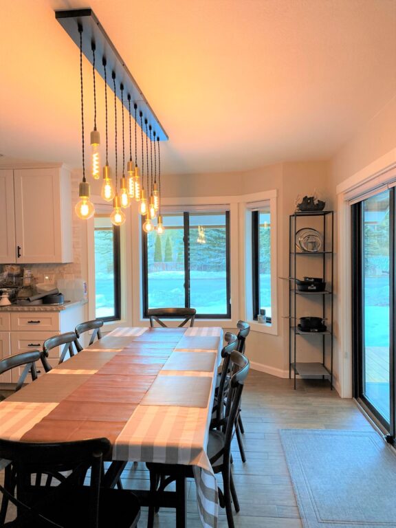 residential interior dining Downtown Minimalist 6 Light Chandelier 105 Textured Black 998 Weathered Brass cotton twist on