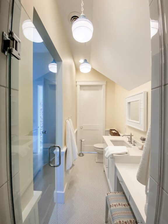 IMG 4594 residential interior bathroom lighting primary schoolhouse chain hung pendant small opaque 715 Delphite Blue 200 White chain Triple painted band