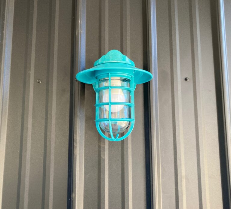IMG 0020 commercial exterior lighting Industrial Static Sconce 390 Teal Flared Shade Cast Guard 390 Teal Clear Glass