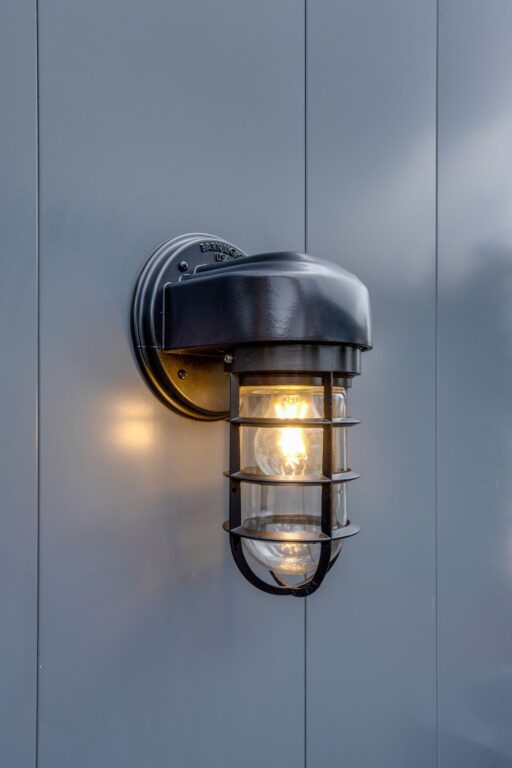 IMG 5521 fused streamline industrial guard sconce atomic 100 black CGG standard cast guard clear glass commercial exterior on