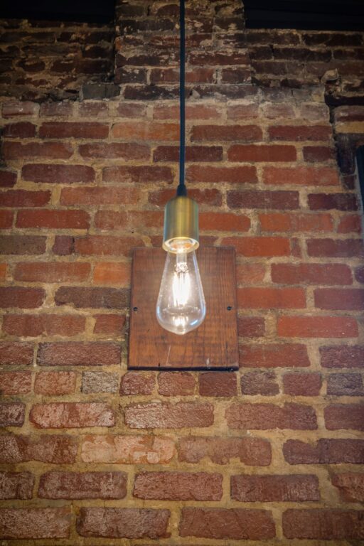 IMG 5586 fused commercial interior downtown minimalist cord pendant 997 raw brass on SBK standard black cord