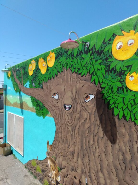 IMG 20220421 134315145 commercial exterior lighting mural Marathon Gooseneck 16in 765 Delphite 490 Magenta G22arm 980 Brushed Aluminum Wire Cage