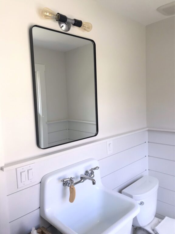 image12 residential interior bathroom lighting vanity Downtown Minimalist Double Sconce 975 Galvanized Cup 100 Black 1910 Edison Bulb