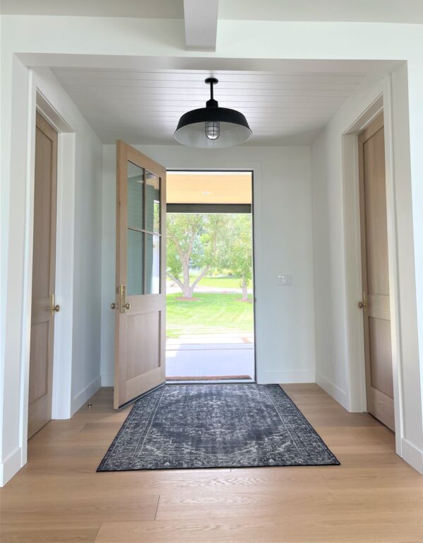 IMG 0371 residential interior lighting entryway foyer Original Stem Mount Pendant 24in 105 Textured Black 6in stem WGG Ribbed Glass