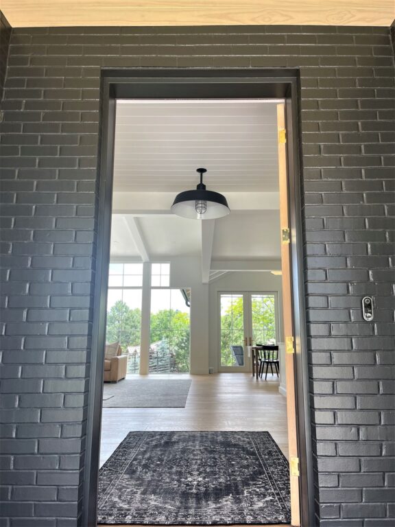 IMG 0372 residential interior lighting entryway foyer Original Stem Mount Pendant 24in 105 Textured Black 6in stem WGG Ribbed Glass