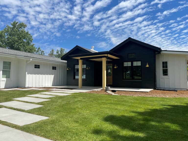 IMG 0383 residential exterior lighting porch Union Gooseneck 12in 997 Raw Brass G15arm Brass BP Hex Cover