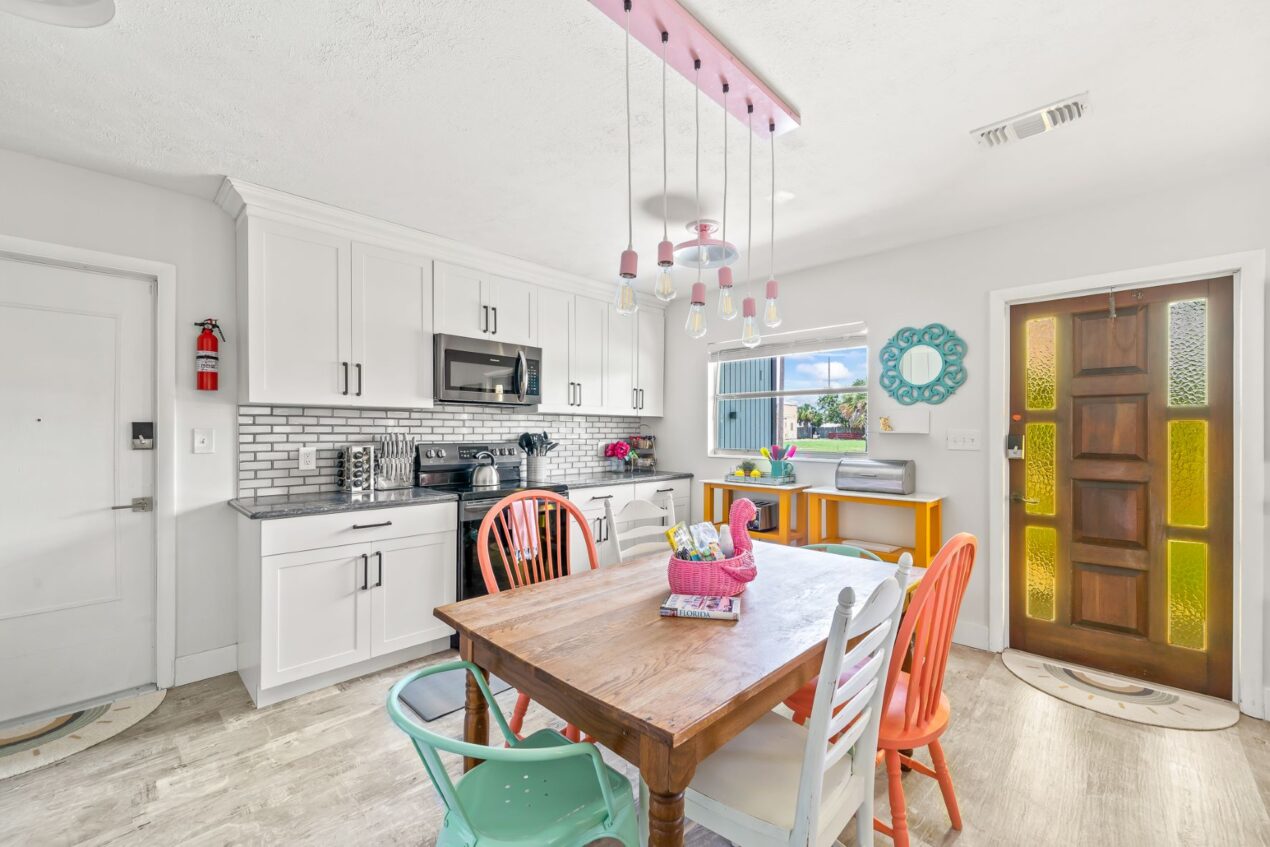 Blush Pink Pendant Lighting Brightens Florida Kitchen
