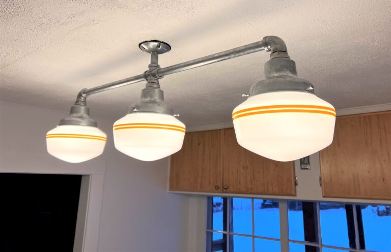 IMG 1255 residential interior lighting kitchen Primary Schoolhouse 3 Light Chandelier Small Opaque 975 Galvanized 18in arms 3in stem PB2 500 Buttery Yellow
