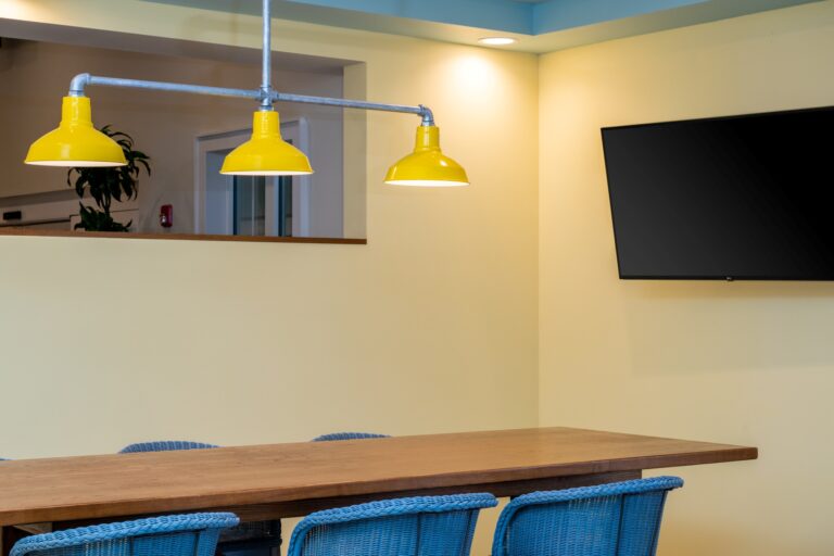 Margaritaville Lodge 10 Commercial interior lighting restaurant Dino 3 Light Stem Mount Pendant 500 Buttery Yellow24in Stem 975 Galvanized