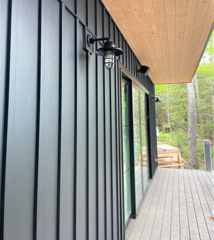 IMG 5462 residential exterior lighting porch Industrial Guard Sconce 100 Black Warehouse Shade CGG Clear Glass